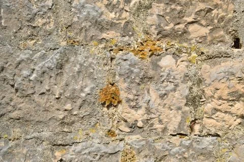 Rough stone wall Stock Photos