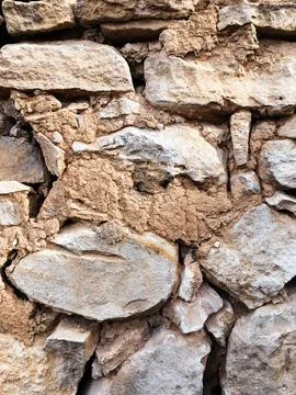Rough stone wall texture background Stock Photos