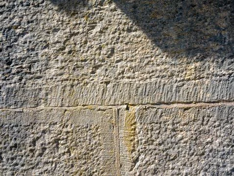 Rough stone wall texture background Stock Photos
