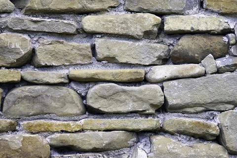 Rough stone wall texture Stock Photos