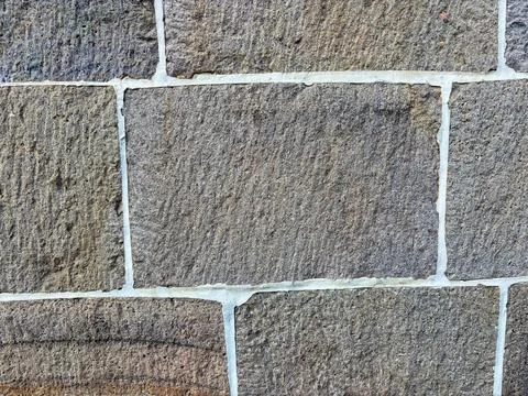 Rough Stone Wall Texture with White Mortar Lines Foto stock
