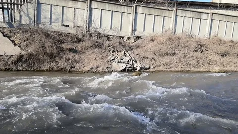 Rough stream of the polluted river. Stock Footage 86220341