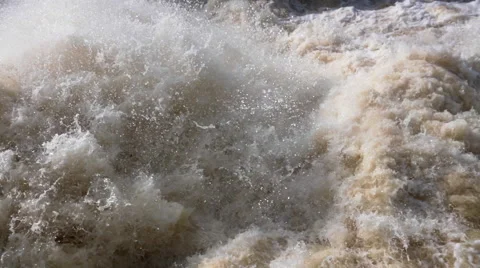Rough stream of water discharge at a dam Stock Footage 61807275