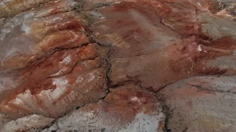 Rough surface of red colored rocky formation with cracks and ravines Stock Footage 156926886