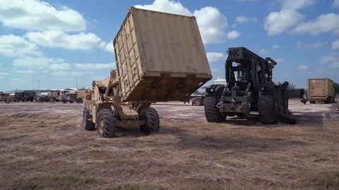 Rough Terrain Container Handler moving small container 1 Stock Footage 112127028