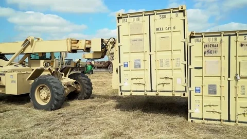 Rough Terrain Container Handler moving small container 3 Video stock 112127065