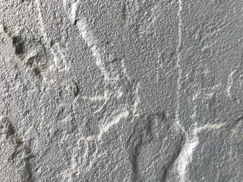 The rough texture of the gray cement wall Stock Photos