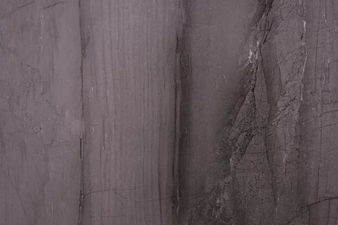 Rough texture of a gray stone surface Stock Photos