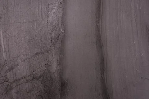 Rough texture of a gray stone surface Stock Photos