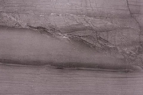 Rough texture of a gray stone surface Stock Photos