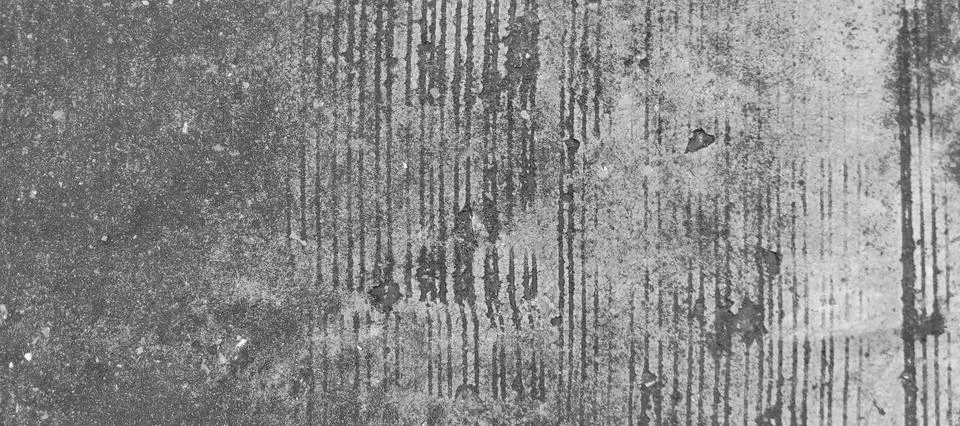 Rough texture of old gray concrete floor with grooved lines and scratches. Stock Photos