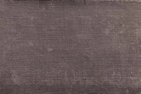 Rough texture old textile material of brown color with attritions Stock Photos