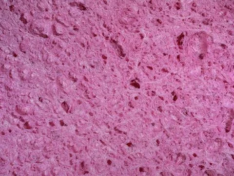 Rough texture of pink sponge. Abstract background Stock Photos