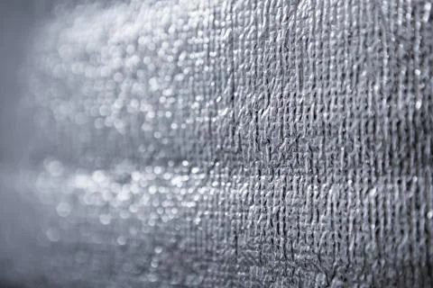 Rough texture of silver foil surface. Stock Photos