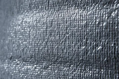 Rough texture of silver foil surface. Stock Photos