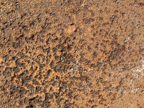 Rough Textured Corroded Iron Surface and Heavy Rusted Metal Sheet Background Stock Photos