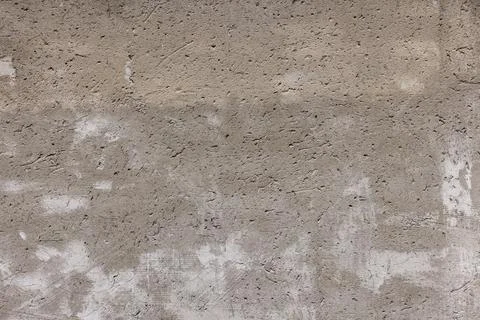 Rough textured outdoor wall during daytime Фото