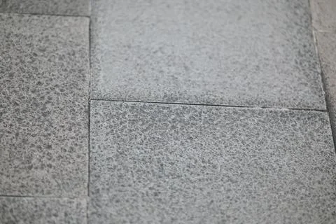 Rough textured stone tiles surface background Stock Photos