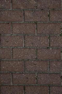 Rough textured surface of red rectangular paving slabs, top view Stock Photos