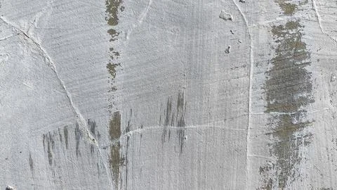 Rough textured wall with aged cement and natural dirt buildup. Cracked surf.. Stock-Fotos