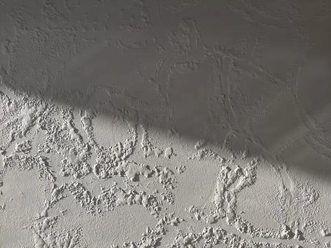 Rough Textured Wall Surface with Diagonal Shadows Stock Photos
