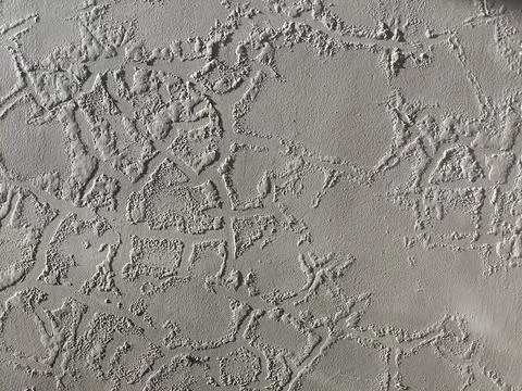 Rough textured wall surfaces and bubbling paint surfaces Foto stock