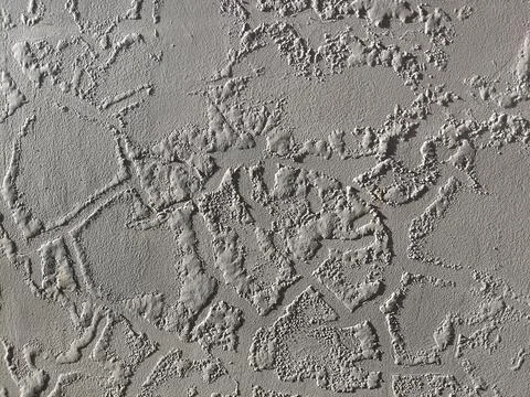 Rough textured wall surfaces and bubbling paint surfaces Stock Photos