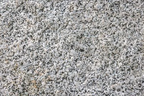 Rough textured white granite stone texture 库存照片