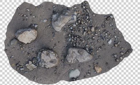 Rough uneven patch of sand with various sized rocks and pebbles 스톡 사진