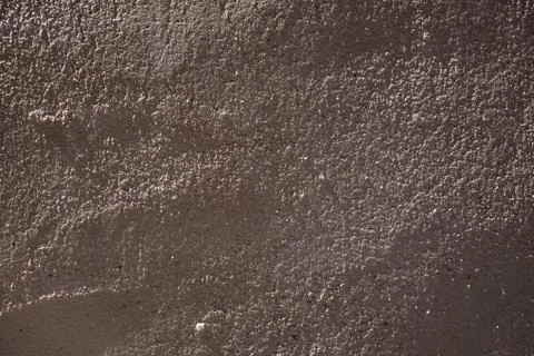 Rough uneven textured surface of plaster wall Stock Photos