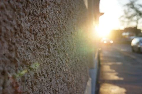 Rough wall against the sun Stock Photos