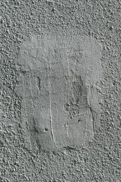 Rough wall covered with plaster and painted. Stock Photos