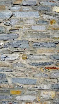 Rough wall stone texture close up vertical Stock Photos