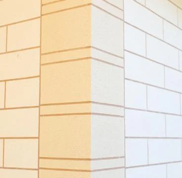 Rough wall texture, wall background, house facade with spatula technology. Cl Stock Photos