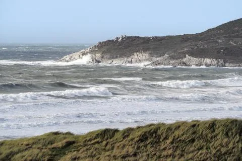 Rough waves breaking on Morte Point from Woolacombe sand dunes, Devon Photos