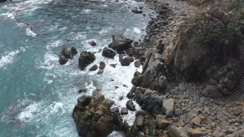 Rough Waves Crashing Over Rocks Vietnam Aerial Drone Shot Stock Footage 122239570