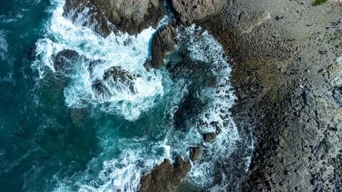 Rough waves hitting the rocks in Hong kong Waters Stock Photos