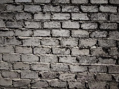 Rough weathered grey brick wall texture Stock Photos