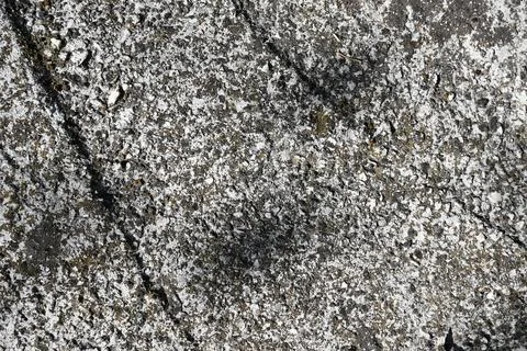 Rough weathered stone surface texture Stockfoto's