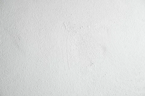 Rough white cement wall background for decoration. Stock Photos