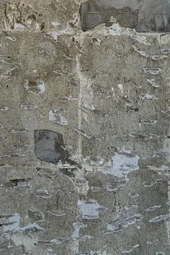 Rough white concrete surface background. old plaster. cracks on the wall Stock Photos