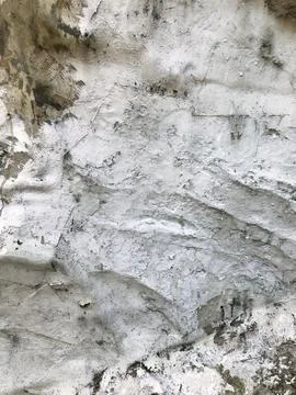 Rough White Plaster Layers with Cracks and Peeling Stock Photos