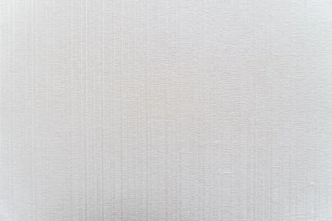 The rough white surface is a messy, small table. Stock Photos