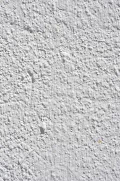 Rough white textured wall background with vertical patterns Stock Photos