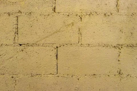 Rough yellow brick wall texture pattern in Coba Mexico. Stock Photos