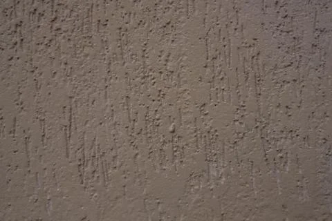 Rough yellow texture wall. Stock Photos