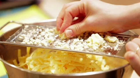 Roughly grate cheese Stock Footage 149118616