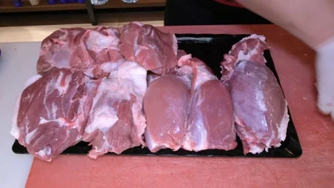 Roughly sliced pieces of raw lamb. Stock Footage 167916306