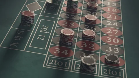 "Roulette table with casino chips or tokens stacking on a bet. Timelapse." Stock Footage 97889135