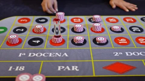 Roulette table with winning number marked and chips placed Stockbeeldmateriaal 315896082
